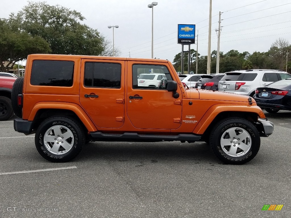 2011 Wrangler Unlimited Sahara 4x4 - Mango Tango Pearl / Black/Dark Saddle photo #6