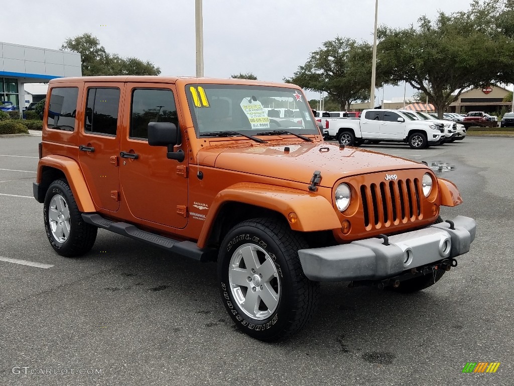 2011 Wrangler Unlimited Sahara 4x4 - Mango Tango Pearl / Black/Dark Saddle photo #7
