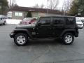 2010 Natural Green Pearl Jeep Wrangler Unlimited Sport 4x4 #132245754