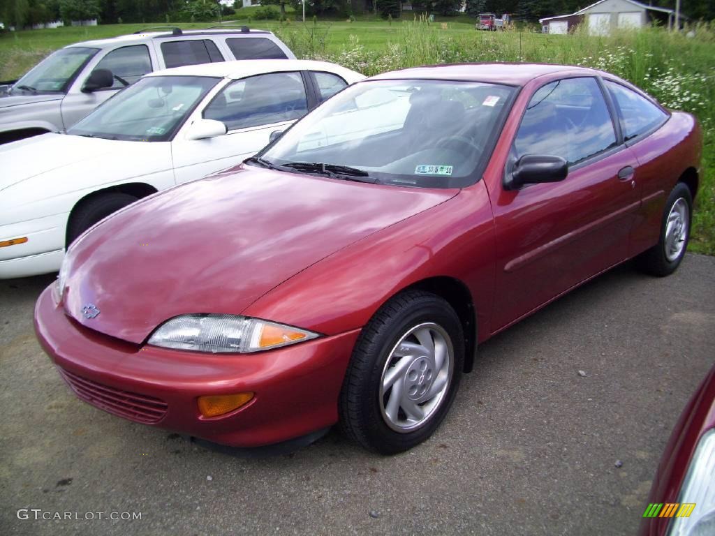 1997 Cavalier Coupe - Cayenne Red Metallic / Graphite photo #1
