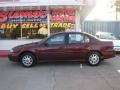 1997 Dark Carmine Red Metallic Chevrolet Malibu LS Sedan #13238646