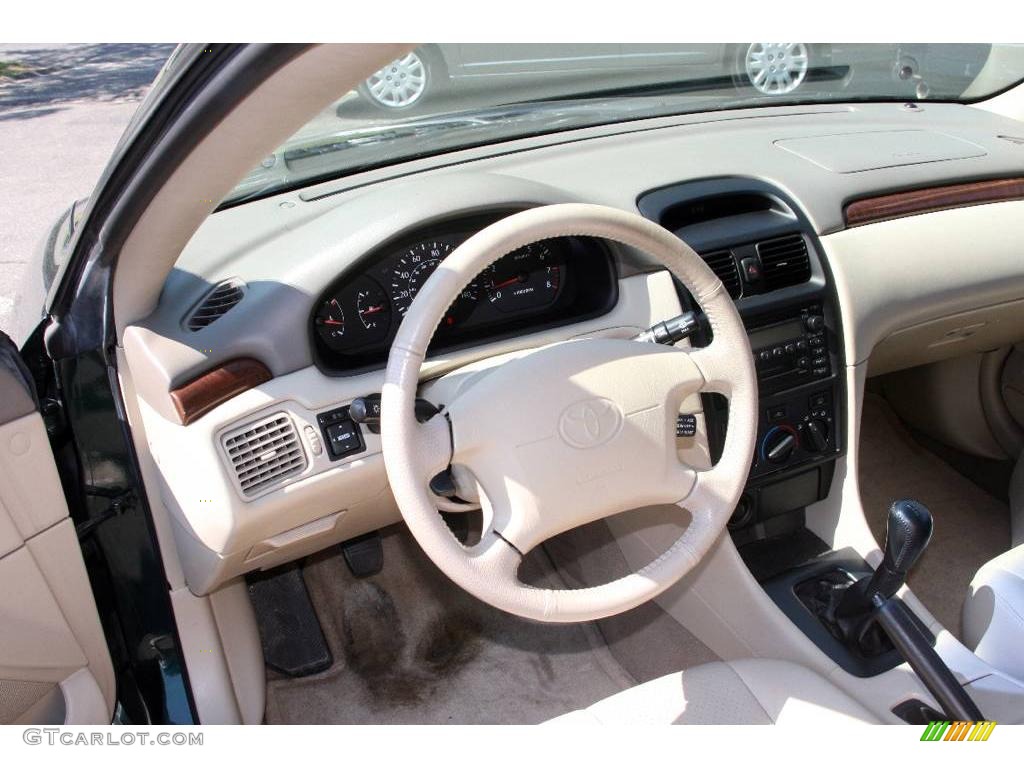 2000 Solara SE V6 Coupe - Fairway Green Pearl / Ivory photo #16