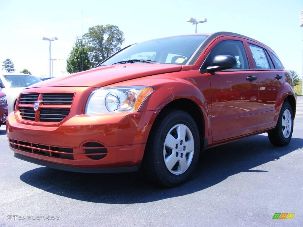 2009 Caliber SE - Sunburst Orange Pearl / Dark Slate Gray photo #1