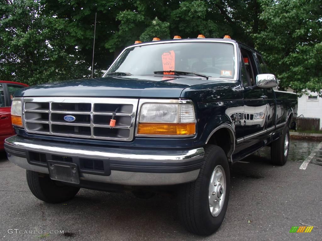 1996 F250 XLT Extended Cab 4x4 - Dark Tourmaline Green Metallic / Grey photo #1