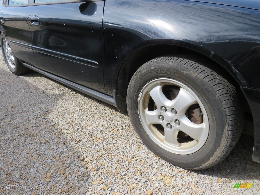 2006 Taurus SE - Black / Medium/Dark Flint Grey photo #2