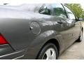 2003 Liquid Grey Metallic Ford Focus SE Sedan  photo #15