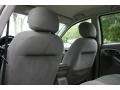 2003 Liquid Grey Metallic Ford Focus SE Sedan  photo #51