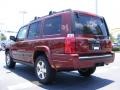 2009 Red Rock Crystal Pearl Jeep Commander Sport  photo #2