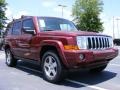 2009 Red Rock Crystal Pearl Jeep Commander Sport  photo #4