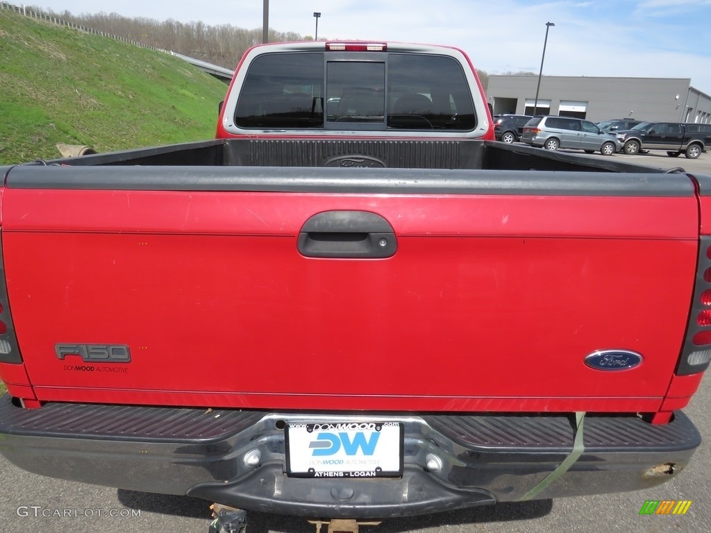 1998 F150 XLT SuperCab 4x4 - Bright Red / Medium Graphite photo #18