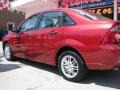 2005 Sangria Red Metallic Ford Focus ZX4 SE Sedan  photo #4