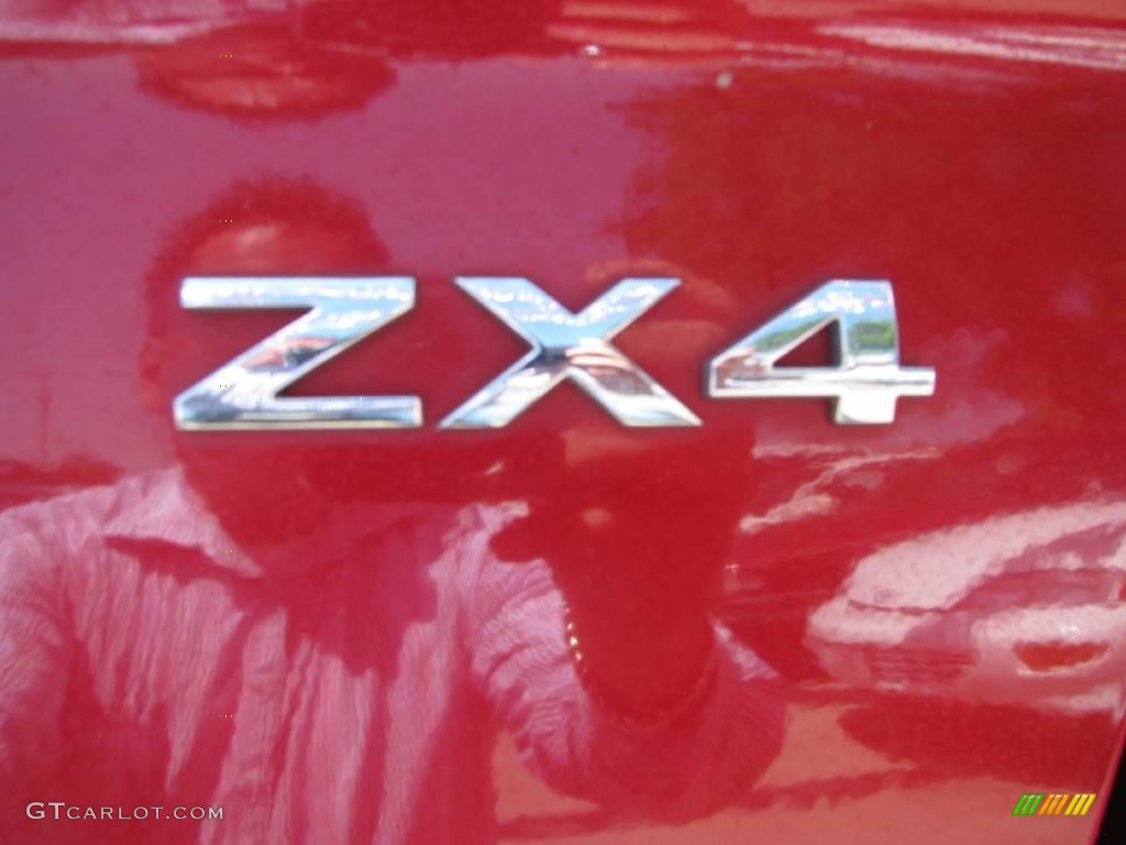 2005 Focus ZX4 SE Sedan - Sangria Red Metallic / Dark Pebble/Light Pebble photo #22