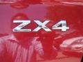 2005 Sangria Red Metallic Ford Focus ZX4 SE Sedan  photo #22