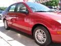 2005 Sangria Red Metallic Ford Focus ZX4 SE Sedan  photo #27