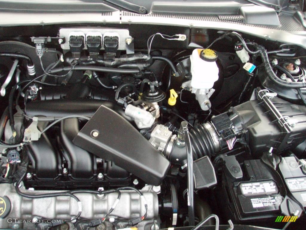 2006 Escape XLT V6 4WD - Titanium Green Metallic / Medium/Dark Pebble photo #18