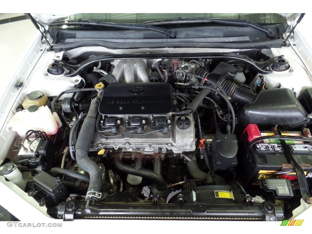 2003 Solara SLE V6 Coupe - Diamond White Pearl / Ivory photo #31