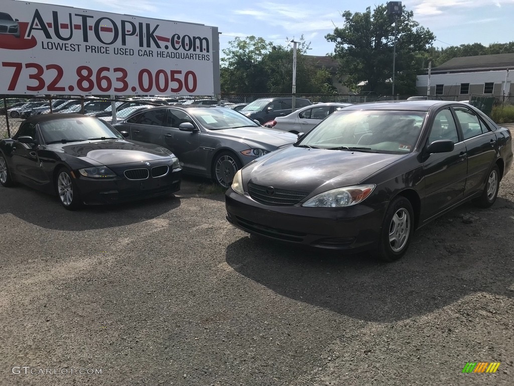 2002 Camry LE V6 - Salsa Red Pearl / Stone photo #1