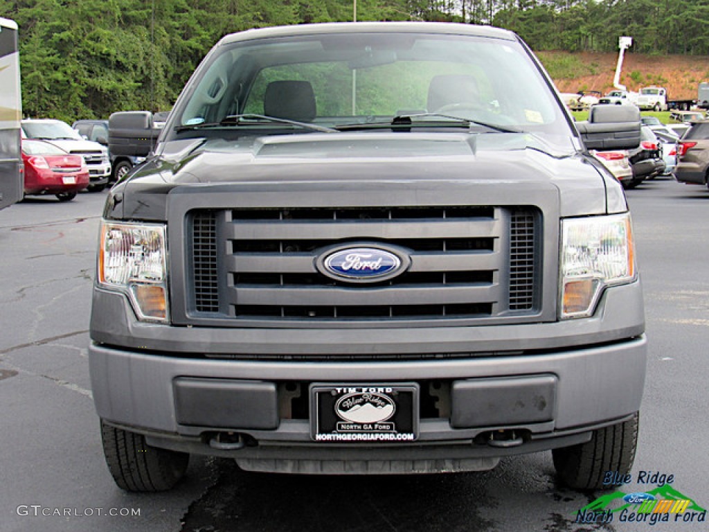 2010 F150 XL Regular Cab 4x4 - Tuxedo Black / Medium Stone photo #8