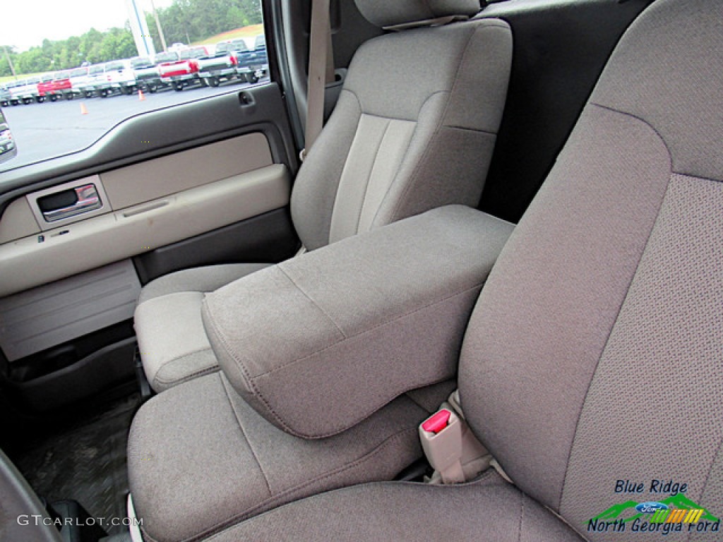 2010 F150 XL Regular Cab 4x4 - Tuxedo Black / Medium Stone photo #21