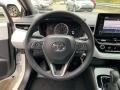 Light Gray Steering Wheel Photo for 2020 Toyota Corolla #135319708