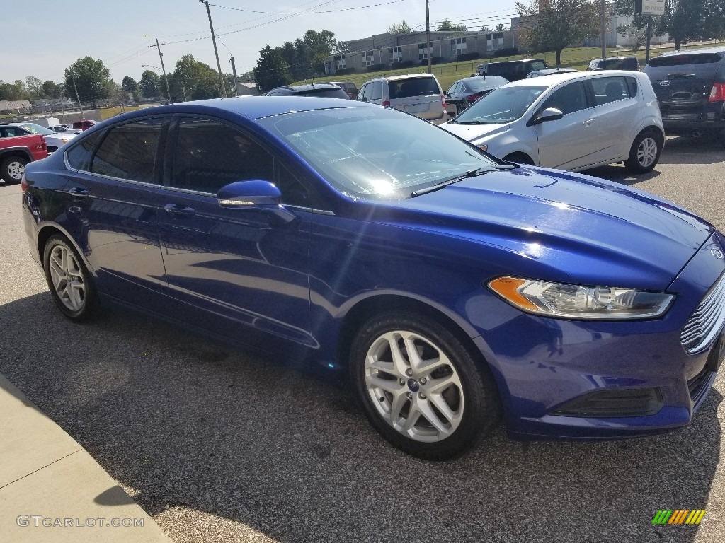 2013 Fusion SE - Deep Impact Blue Metallic / Charcoal Black photo #6