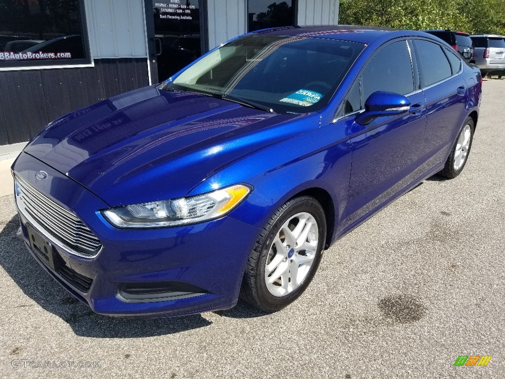 2013 Fusion SE - Deep Impact Blue Metallic / Charcoal Black photo #18