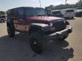 2010 Flame Red Jeep Wrangler Unlimited Sport 4x4  photo #22