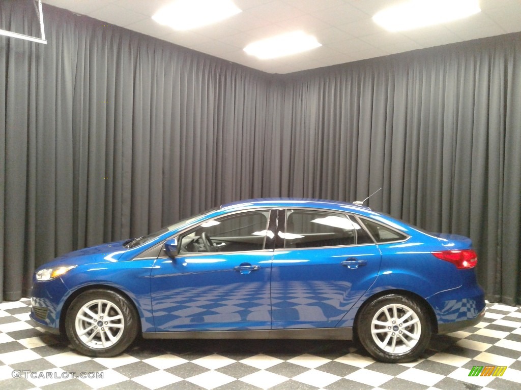 2018 Focus SE Sedan - Lightning Blue / Charcoal Black photo #1