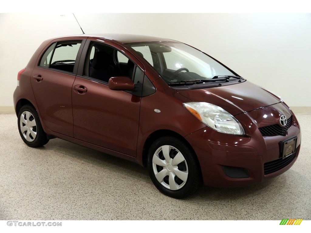 2010 Yaris 5 Door Liftback - Carmine Red Metallic / Dark Charcoal photo #1