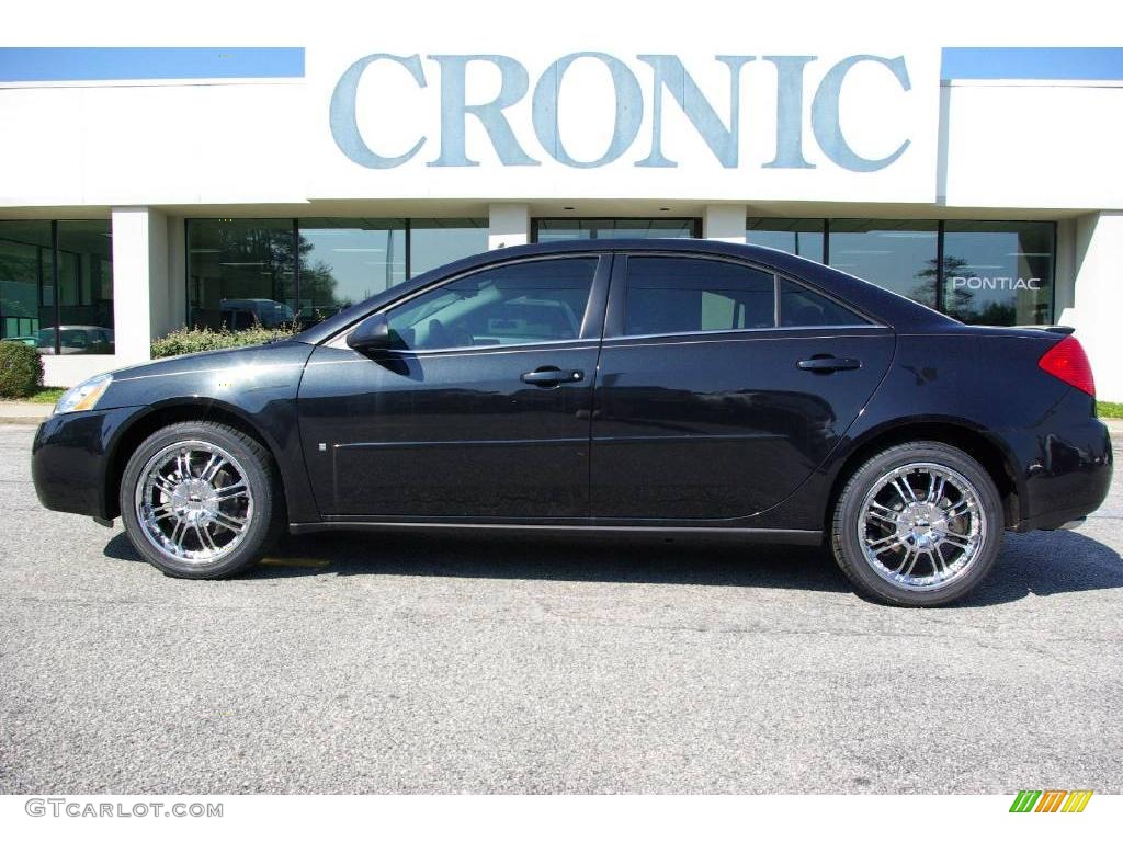 2009 G6 V6 Sedan - Carbon Black Metallic / Ebony photo #1