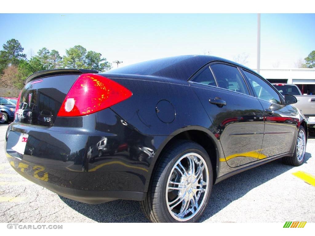 2009 G6 V6 Sedan - Carbon Black Metallic / Ebony photo #6