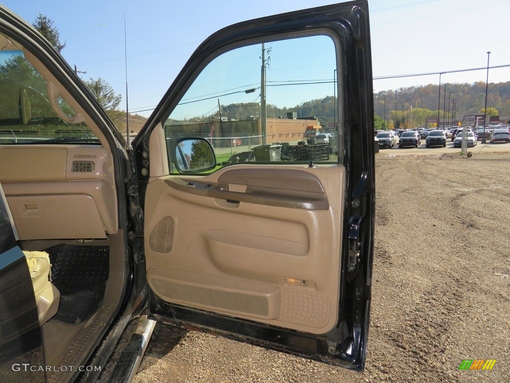 1999 F250 Super Duty Lariat Extended Cab 4x4 - Black / Medium Graphite photo #18