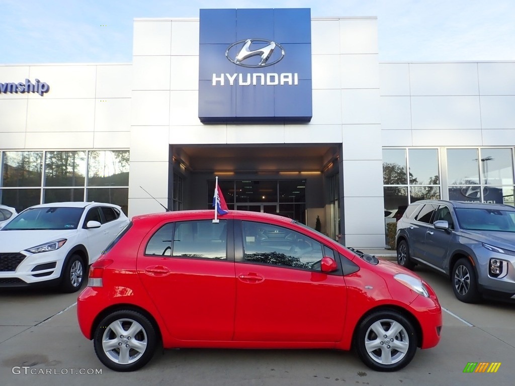 2009 Yaris 5 Door Liftback - Absolutely Red / Dark Charcoal photo #1