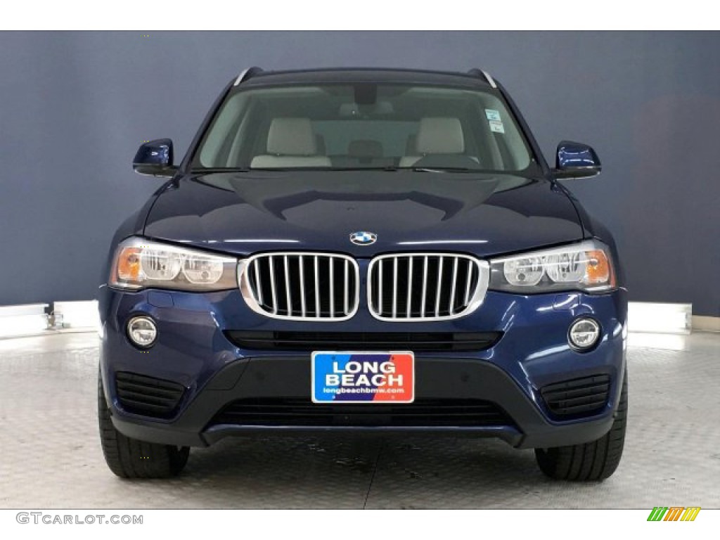 2017 X3 xDrive28i - Deep Sea Blue Metallic / Ivory White w/Red contrast stitching photo #2