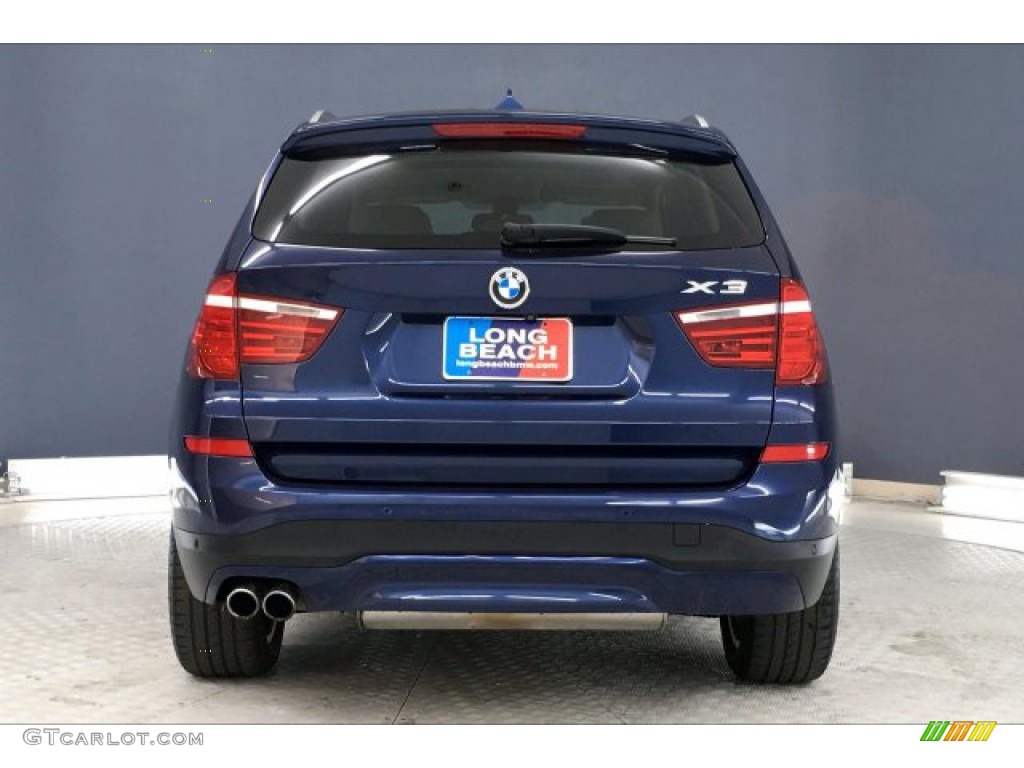 2017 X3 xDrive28i - Deep Sea Blue Metallic / Ivory White w/Red contrast stitching photo #3