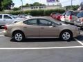 Bronzestone Metallic - Grand Prix Sedan Photo No. 4