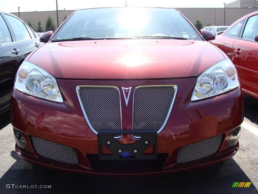 2009 G6 GXP Sedan - Performance Red Metallic / Ebony photo #2