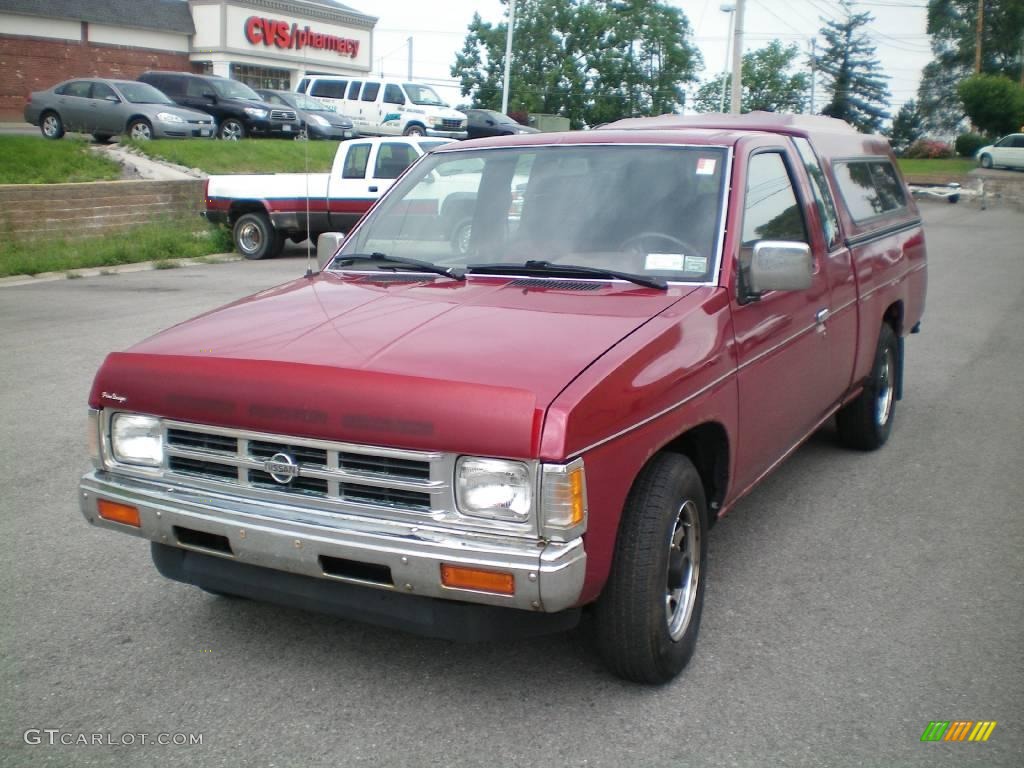 Cherry Red Pearl Nissan Hardbody Truck