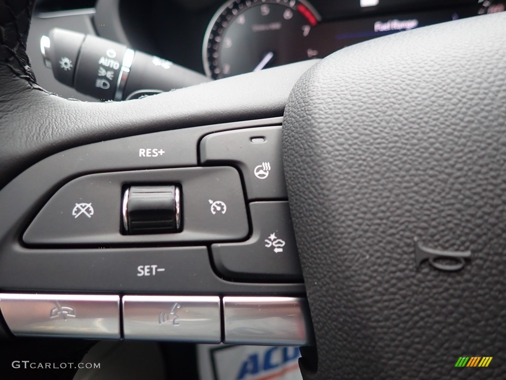 2020 Cadillac XT4 Luxury AWD Jet Black Steering Wheel Photo #136768381