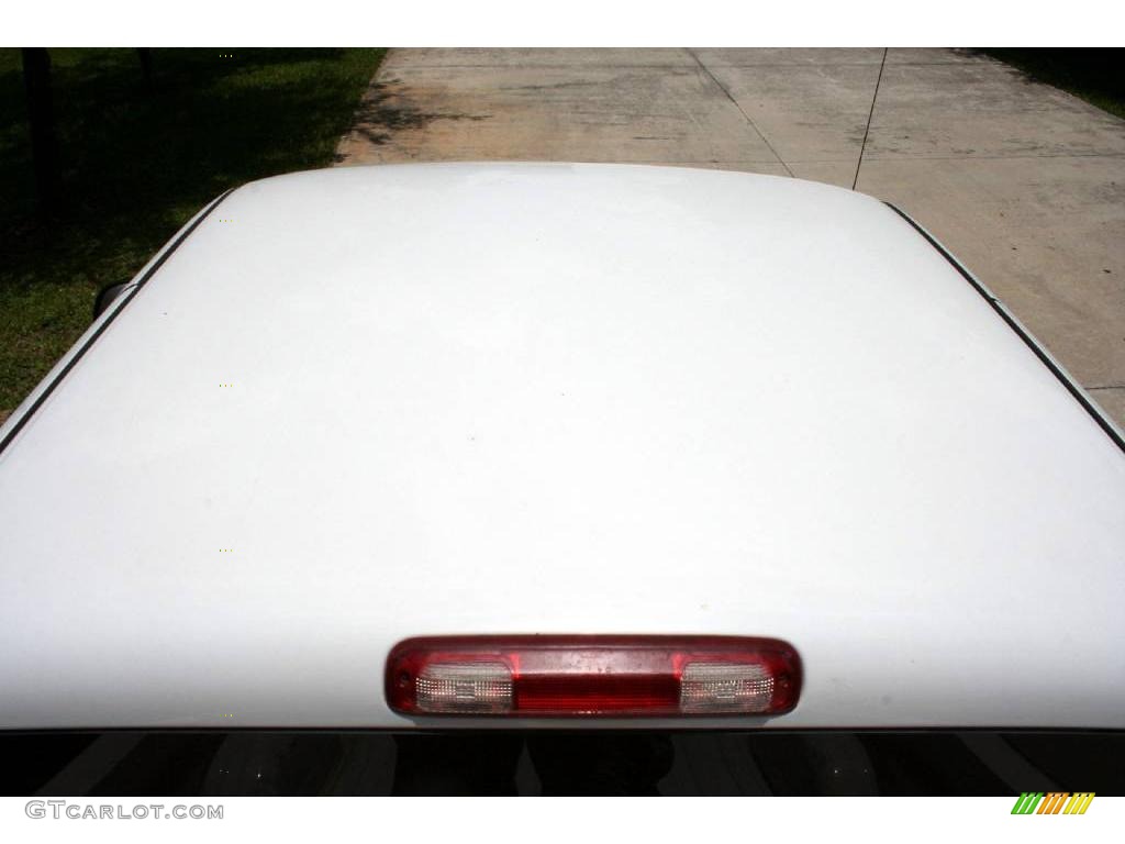 2003 Silverado 2500HD LS Extended Cab 4x4 - Summit White / Tan photo #27