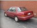 1995 Electric Current Red Metallic Ford Escort LX Sedan  photo #3