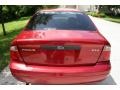 2005 Sangria Red Metallic Ford Focus ZX4 S Sedan  photo #24