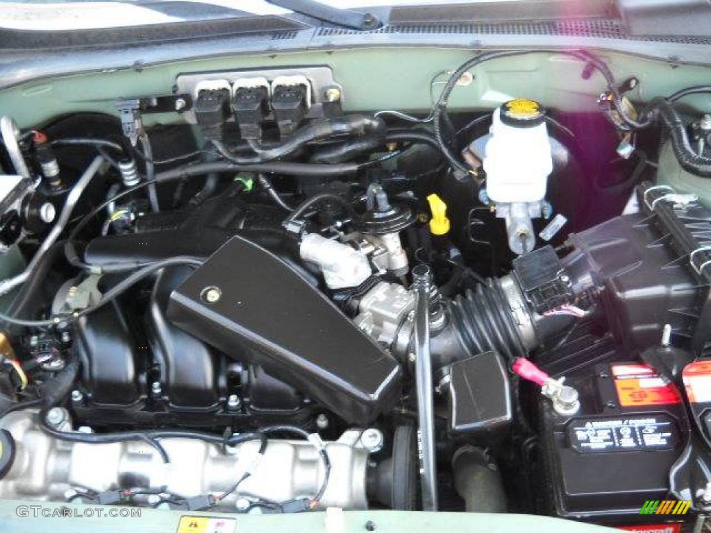 2005 Escape XLT V6 - Titanium Green Metallic / Medium/Dark Pebble Beige photo #20