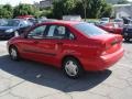 2002 Infra Red Ford Focus LX Sedan  photo #4