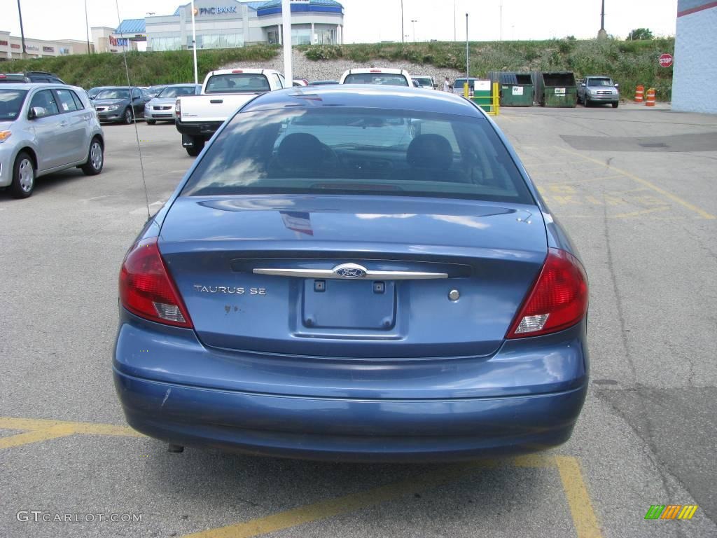 2002 Taurus SE - Medium Royal Blue Metallic / Medium Graphite photo #5