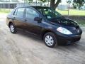 2009 Super Black Nissan Versa 1.6 Sedan  photo #1