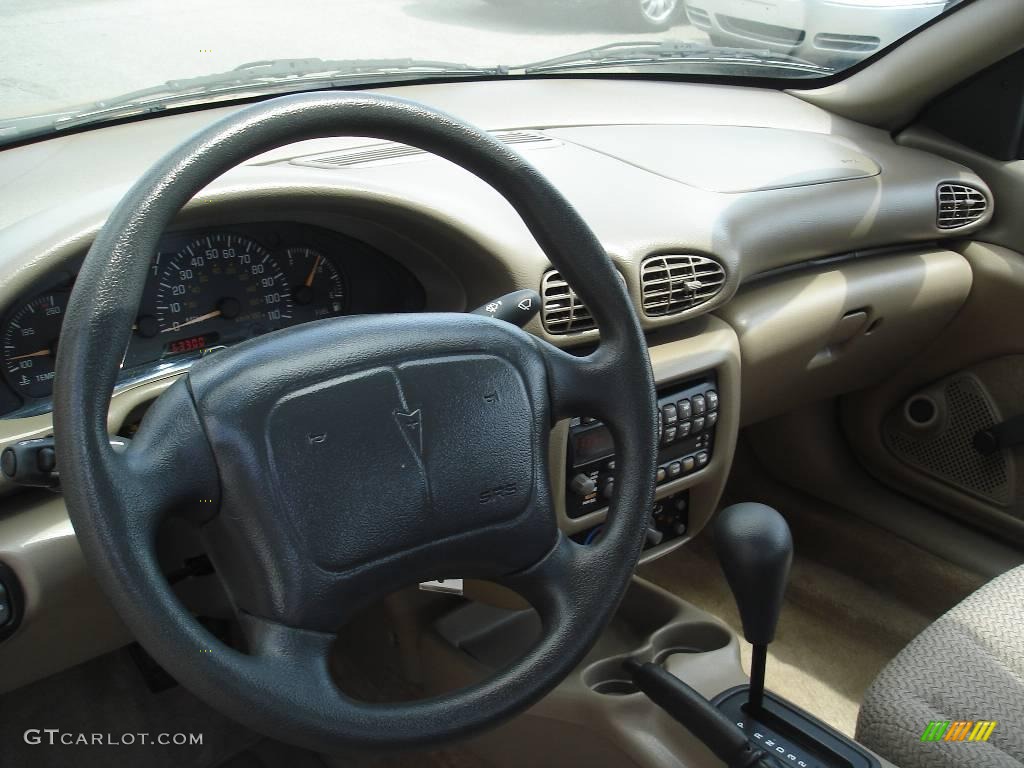 2002 Sunfire SE Coupe - Mayan Gold / Graphite photo #7