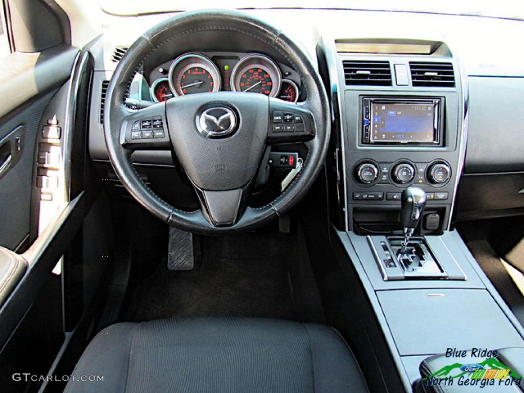 2012 Mazda CX-9 Sport AWD Black Dashboard Photo #138213174