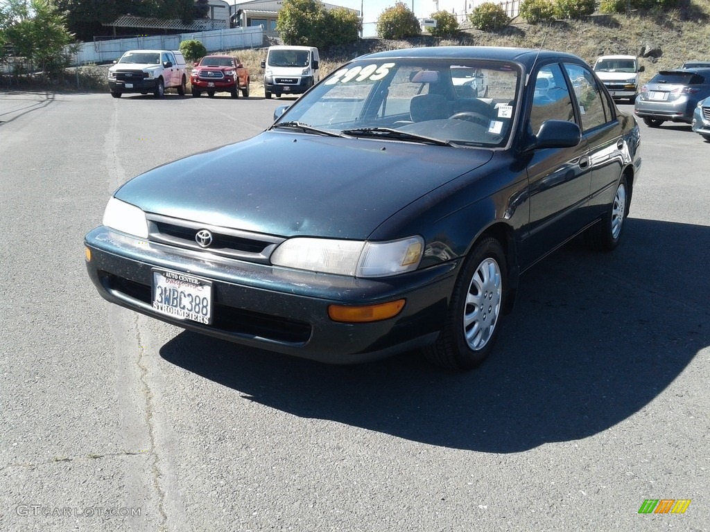 Dark Emerald Pearl Green Metallic 1997 Toyota Corolla DX Exterior Photo #138248174