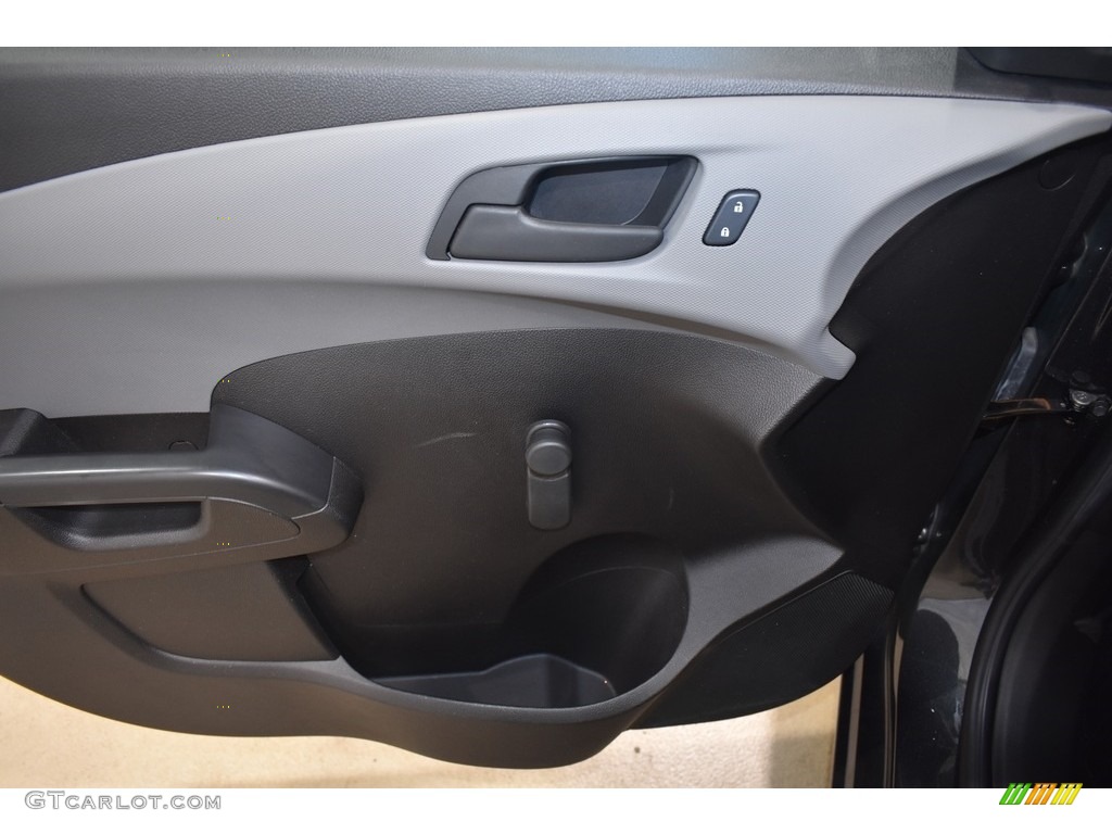2016 Chevrolet Sonic LS Sedan Jet Black/Dark Titanium Door Panel Photo #138287862
